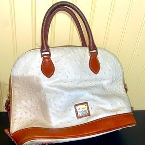 Dooney and Bourke 1975 white leather hand bag. Medium size.
